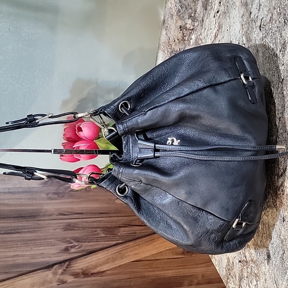 MCM Handbags - 🌵MCM EUC Black Visetos Leather Drawstring Bucket Bag